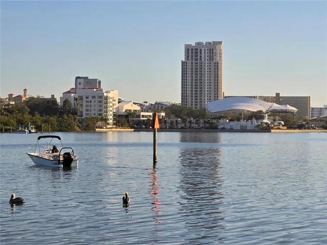 a view of a street with a balcony