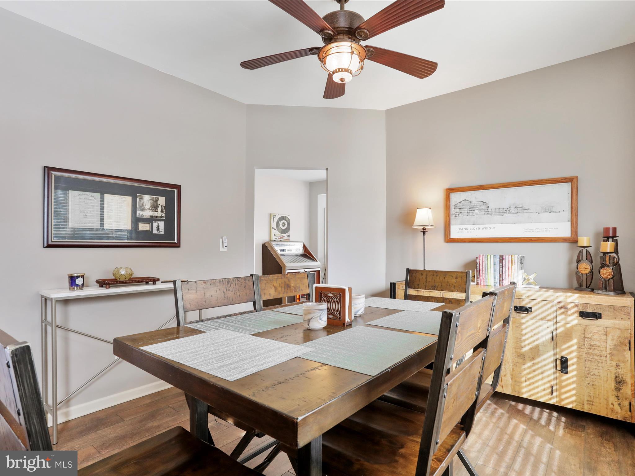 416 Castleton Drive Chambersburg, PA 17202 - Photo 13 of 51 a view of a dining room with furniture and wooden floor