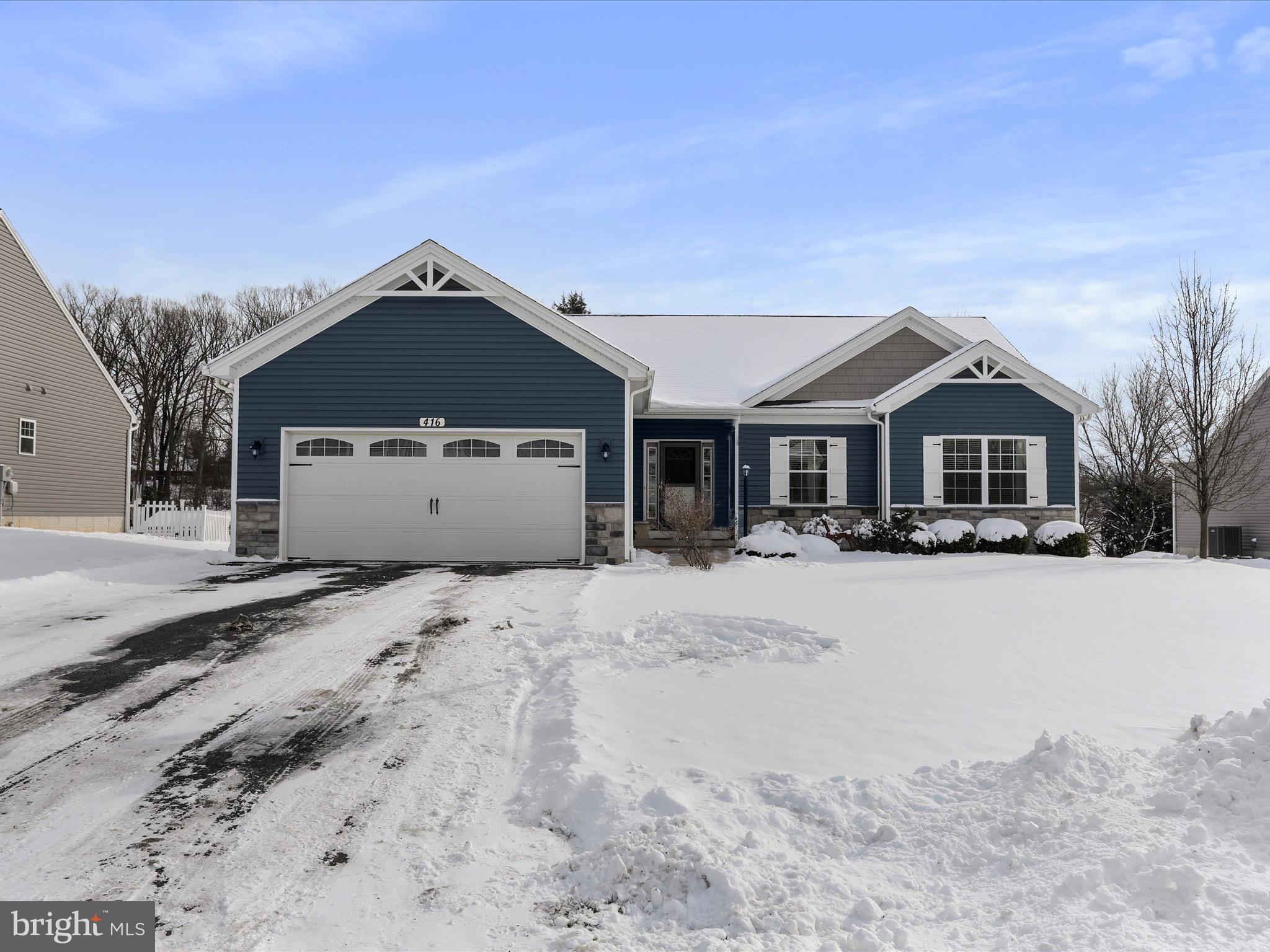 416 Castleton Drive Chambersburg, PA 17202 - Photo 2 of 51 a front view of a house with a yard