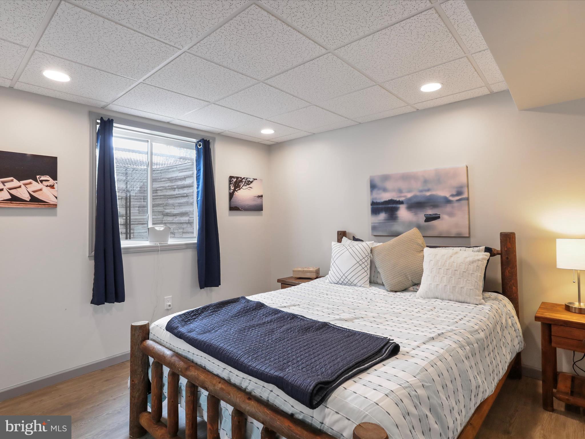416 Castleton Drive Chambersburg, PA 17202 - Photo 39 of 51 a bedroom with a bed and a large window