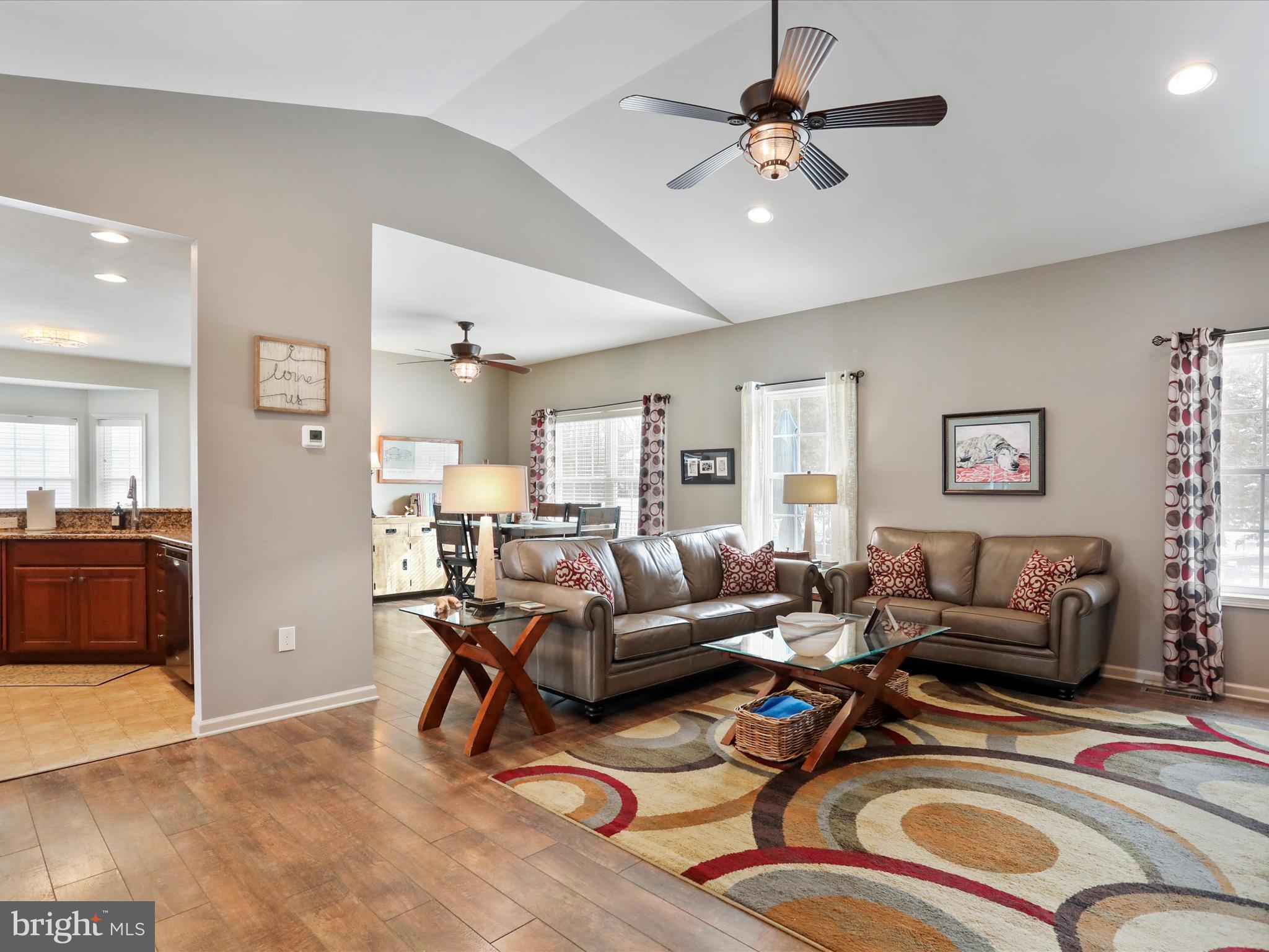 416 Castleton Drive Chambersburg, PA 17202 - Photo 9 of 51 a living room with furniture and a chandelier