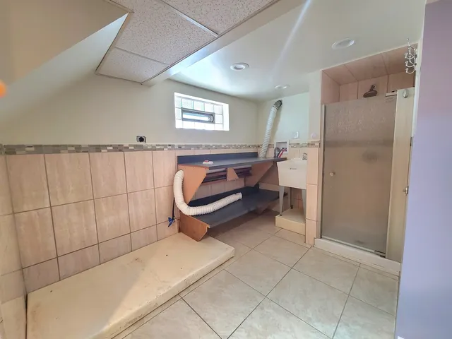 a bathroom with a sink and mirror