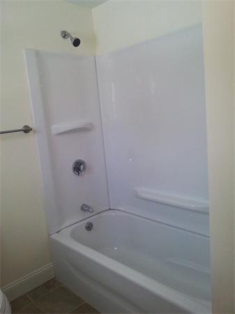102 Shore Road East Brookfield, MA 01515 - Photo 9 of 13 a bathroom with a tub and a shower