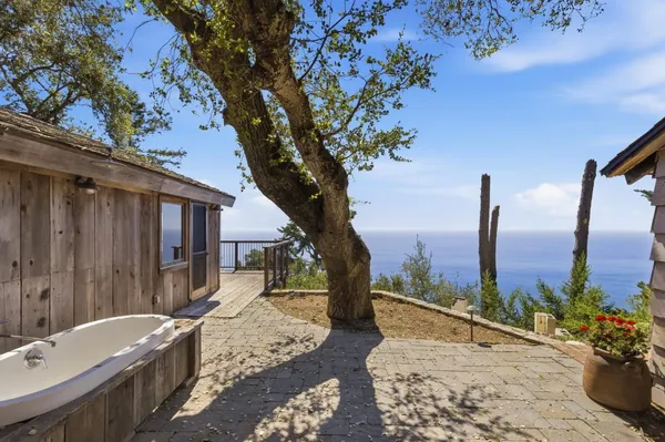 a house view with a backyard space