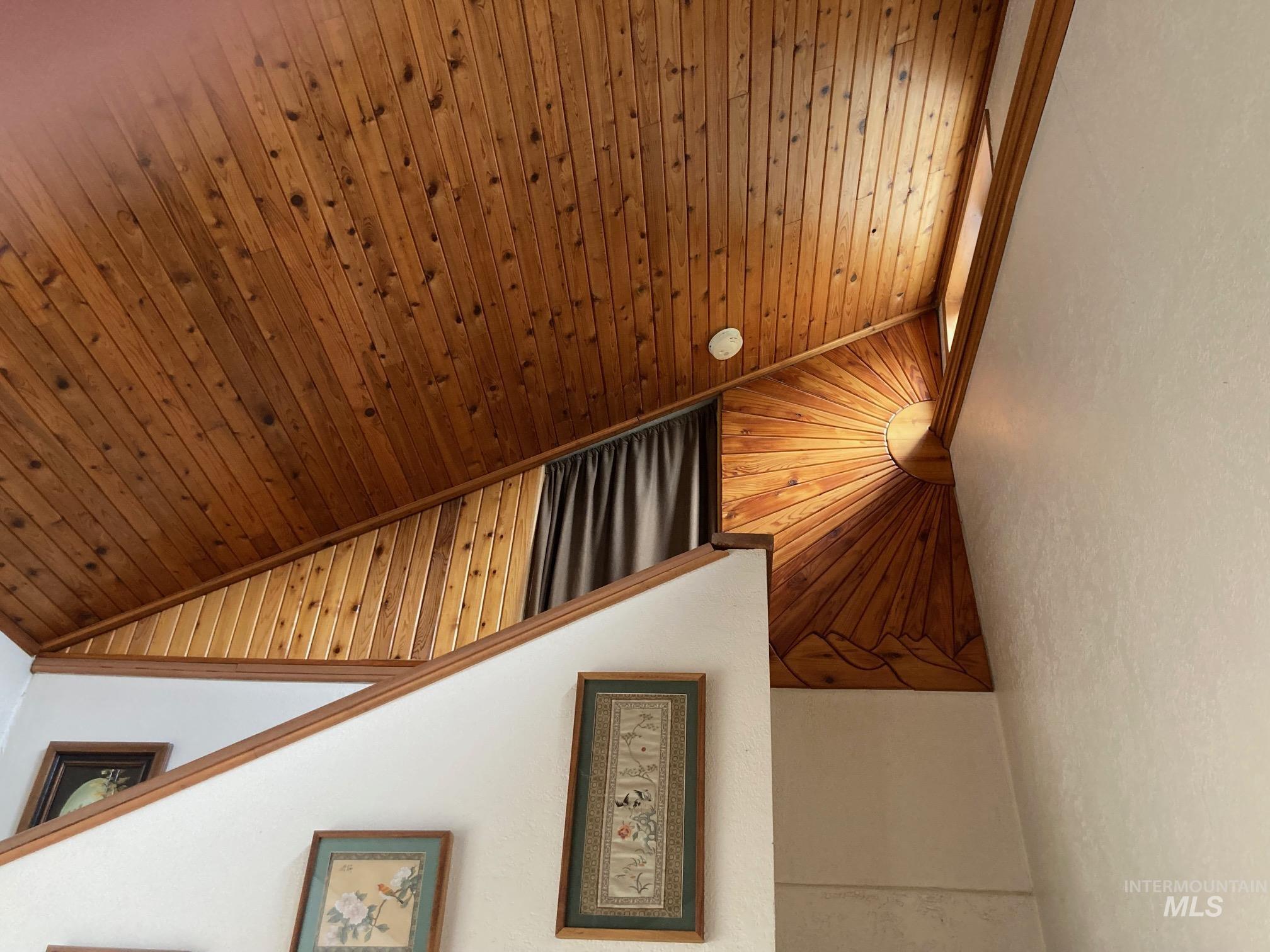 266 Falcon Ridge Road Kooskia, ID 83539 - Photo 19 of 50 Vaulted wood-paneled ceiling with an artistic wood inlay sun design