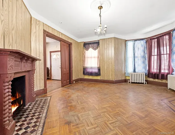 a view of an empty room with windows