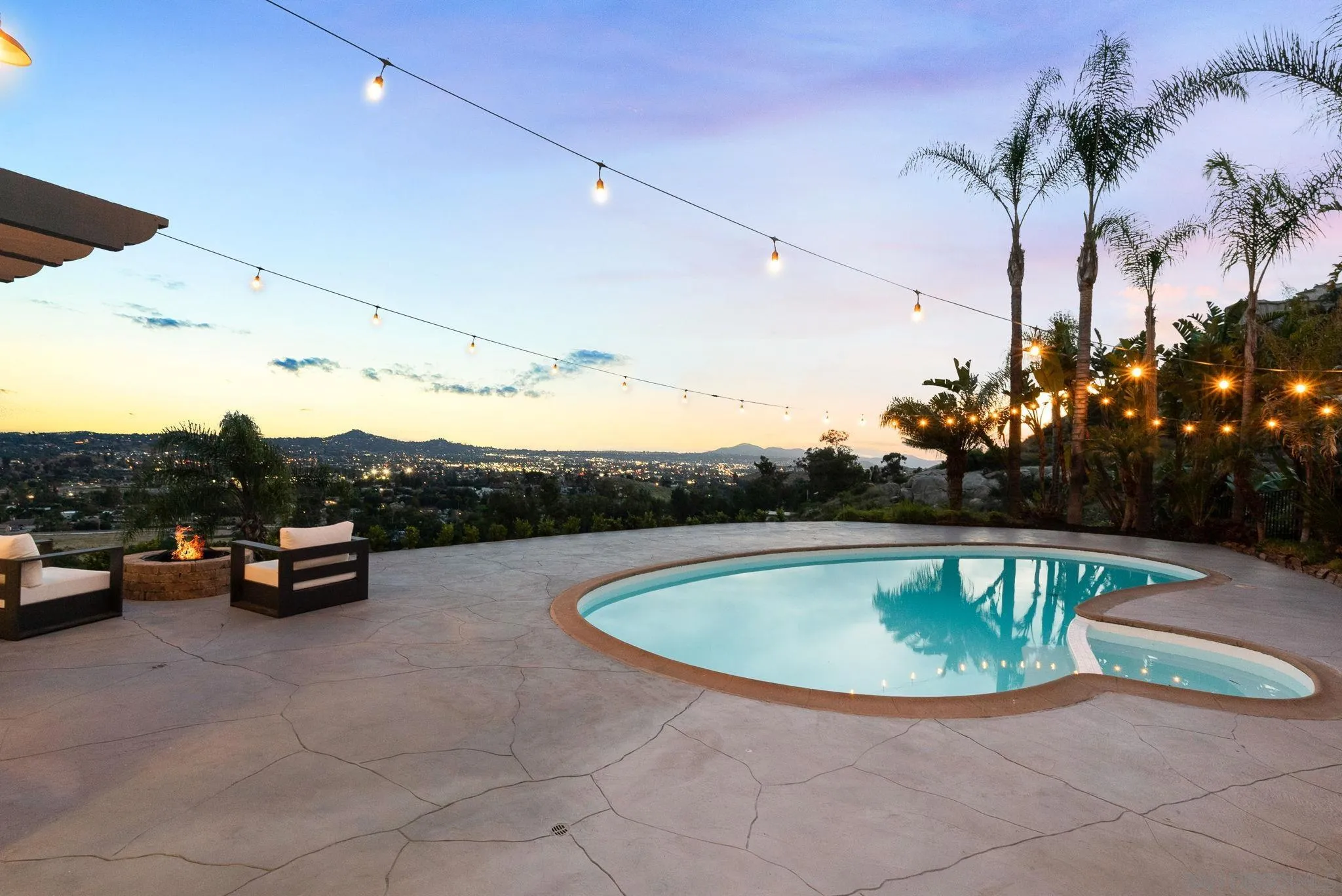 2044 Eula Lane El Cajon, CA 92019 - Photo 13 of 47 a view of swimming pool with a table and chairs