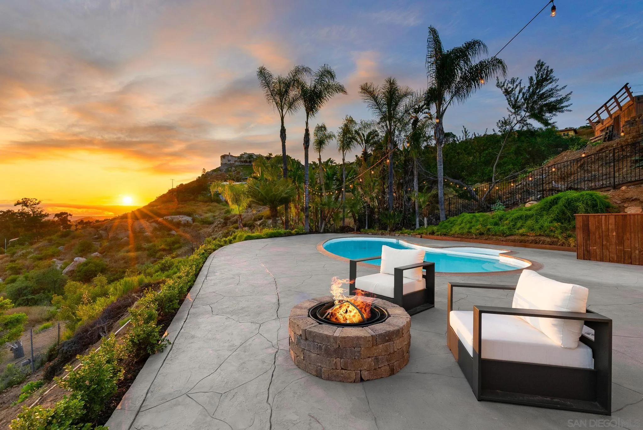 2044 Eula Lane El Cajon, CA 92019 - Photo 20 of 47 a view of swimming pool with a table and chairs