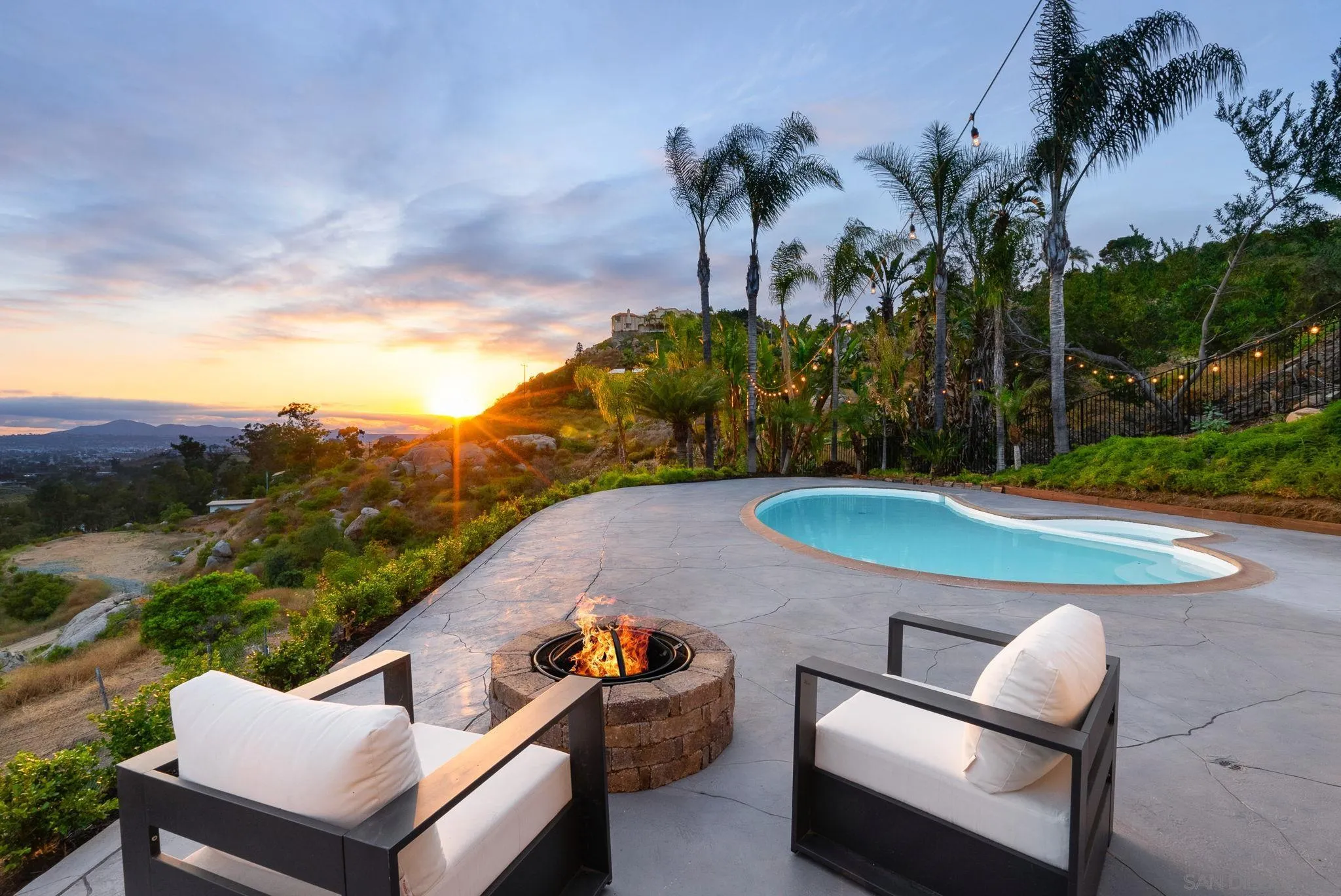 2044 Eula Lane El Cajon, CA 92019 - Photo 24 of 47 a view of a backyard with plants and outdoor seating
