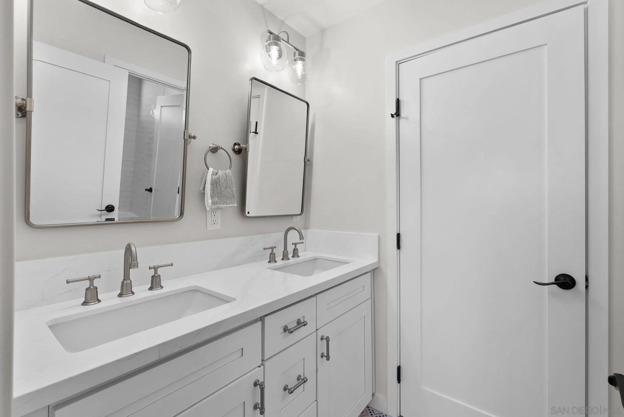 2044 Eula Lane El Cajon, CA 92019 - Photo 30 of 47 a bathroom with a sink and a mirror