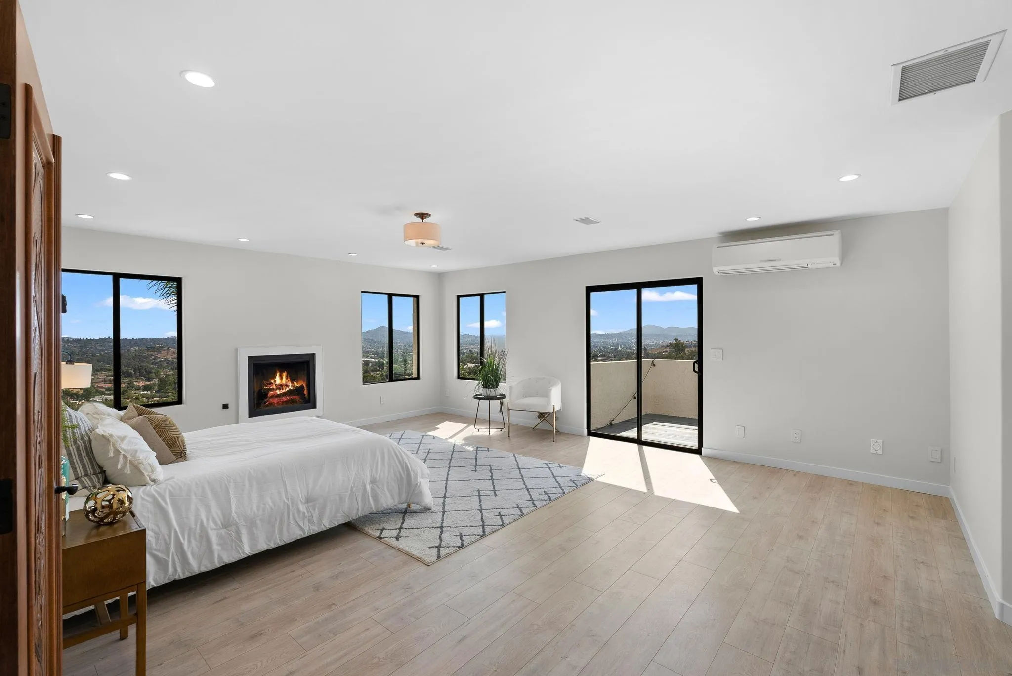 2044 Eula Lane El Cajon, CA 92019 - Photo 34 of 47 a bedroom with a bed and glass door