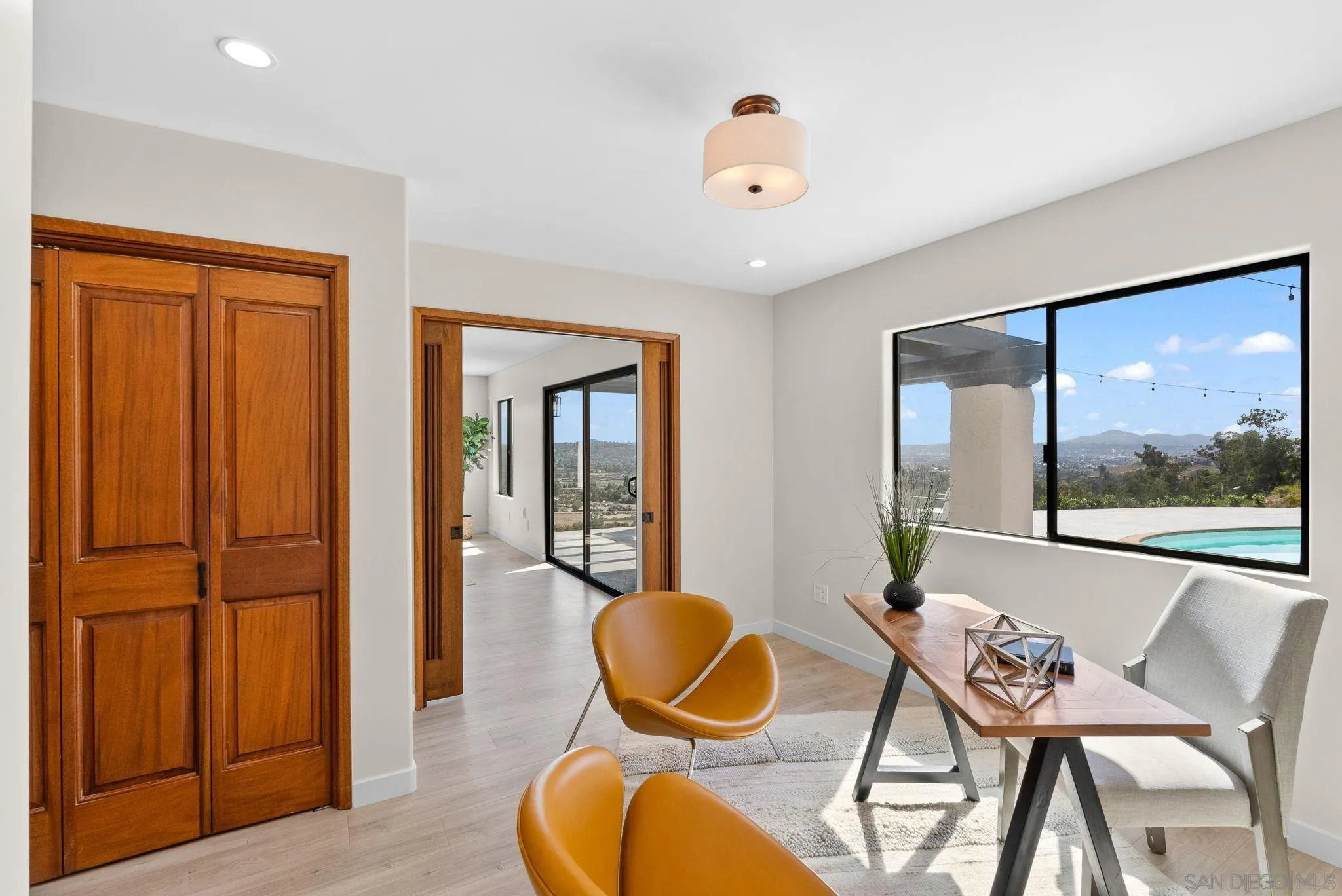 2044 Eula Lane El Cajon, CA 92019 - Photo 37 of 47 a view of a dining room with furniture and wooden floor