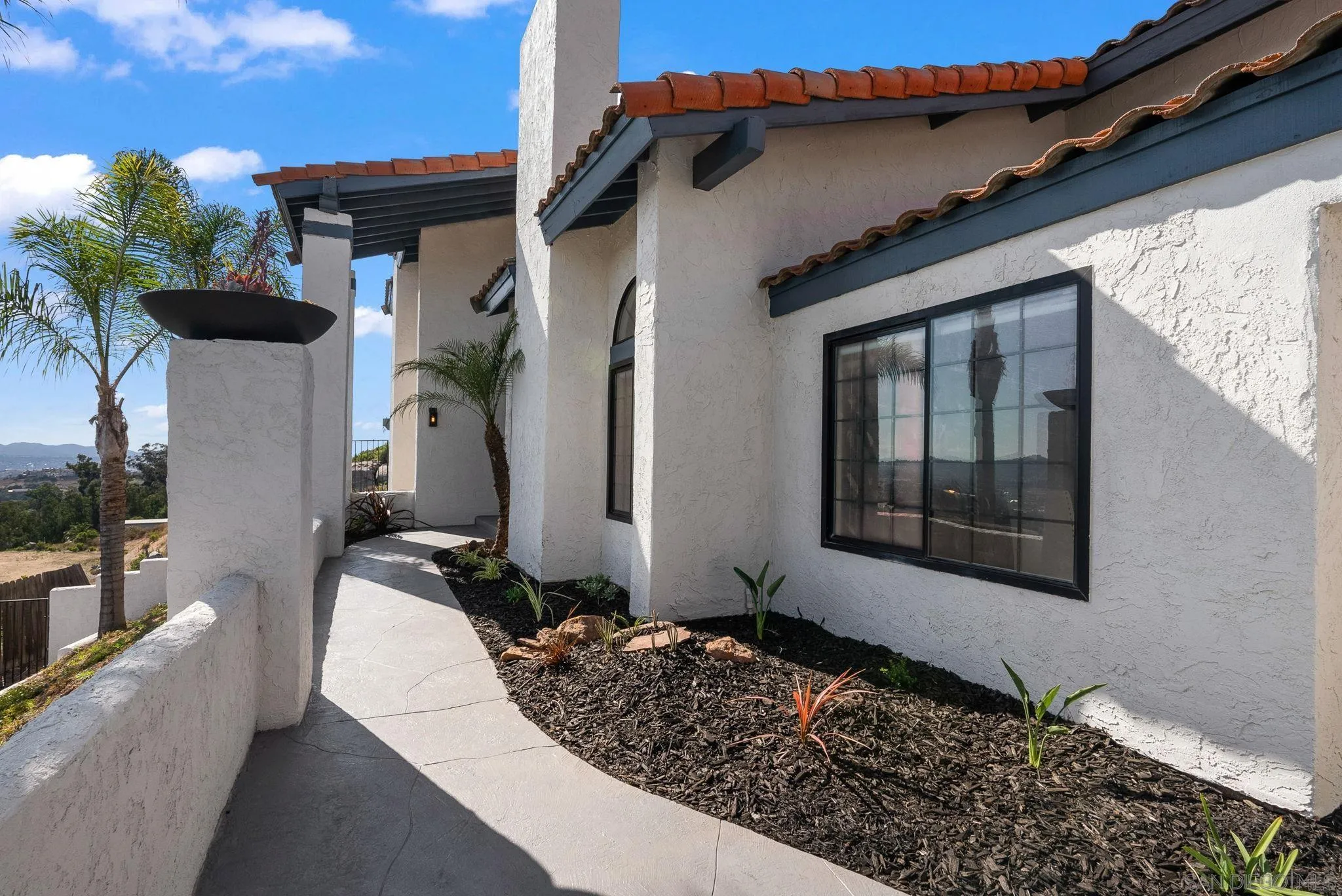 2044 Eula Lane El Cajon, CA 92019 - Photo 41 of 47 a front view of a house with garden