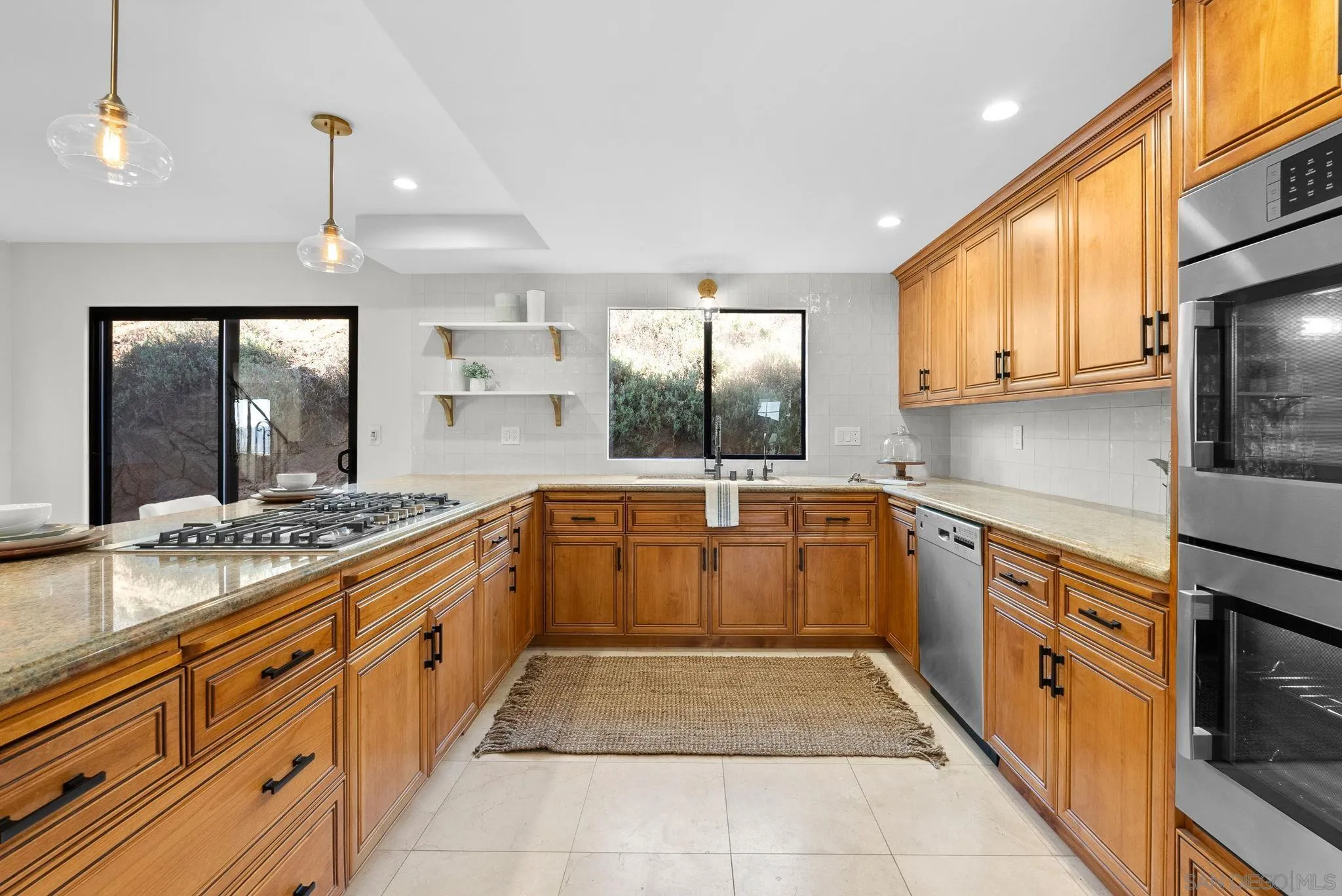 2044 Eula Lane El Cajon, CA 92019 - Photo 6 of 47 a kitchen with sink cabinets and window