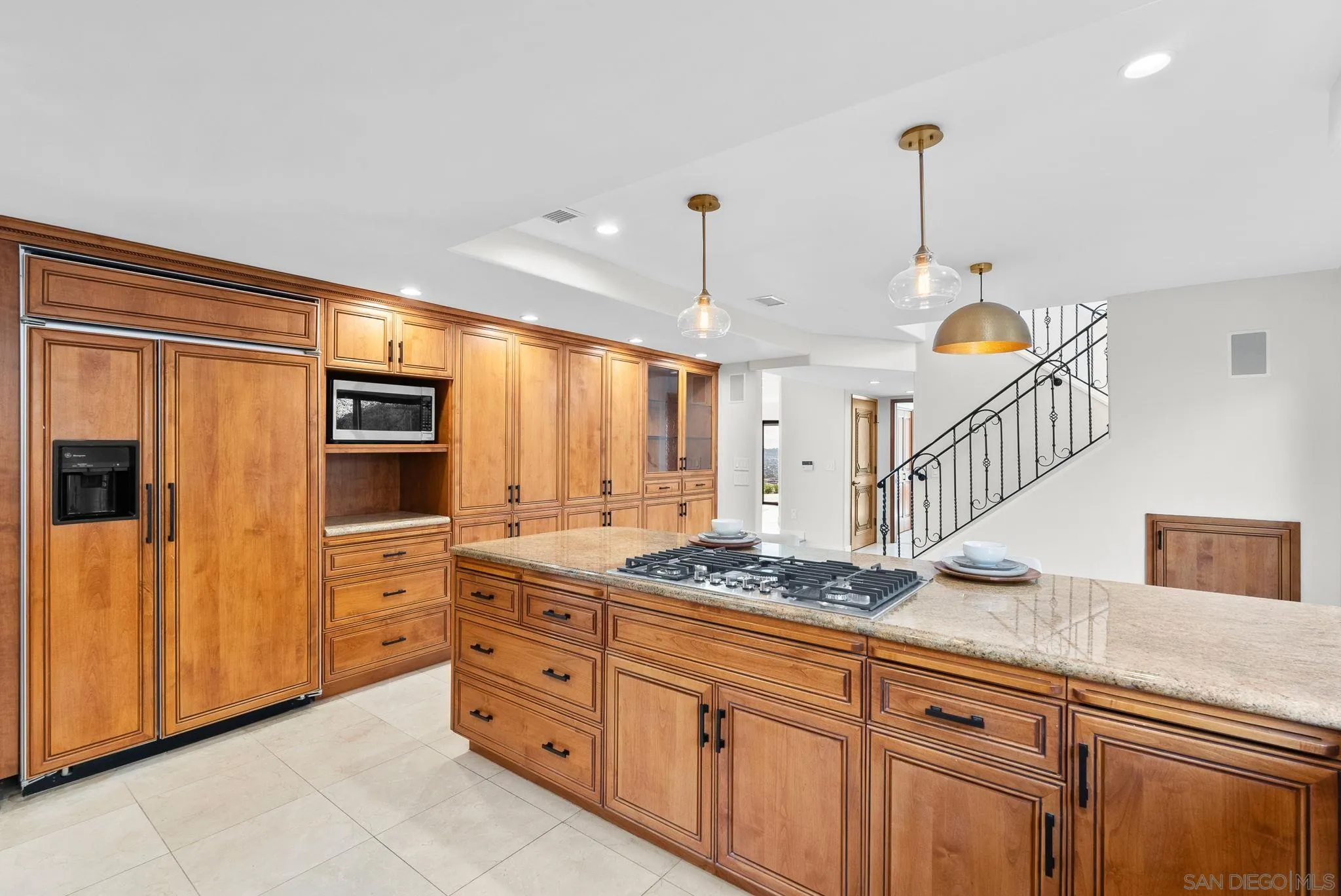 2044 Eula Lane El Cajon, CA 92019 - Photo 8 of 47 a kitchen with stainless steel appliances kitchen island granite countertop a sink and cabinets