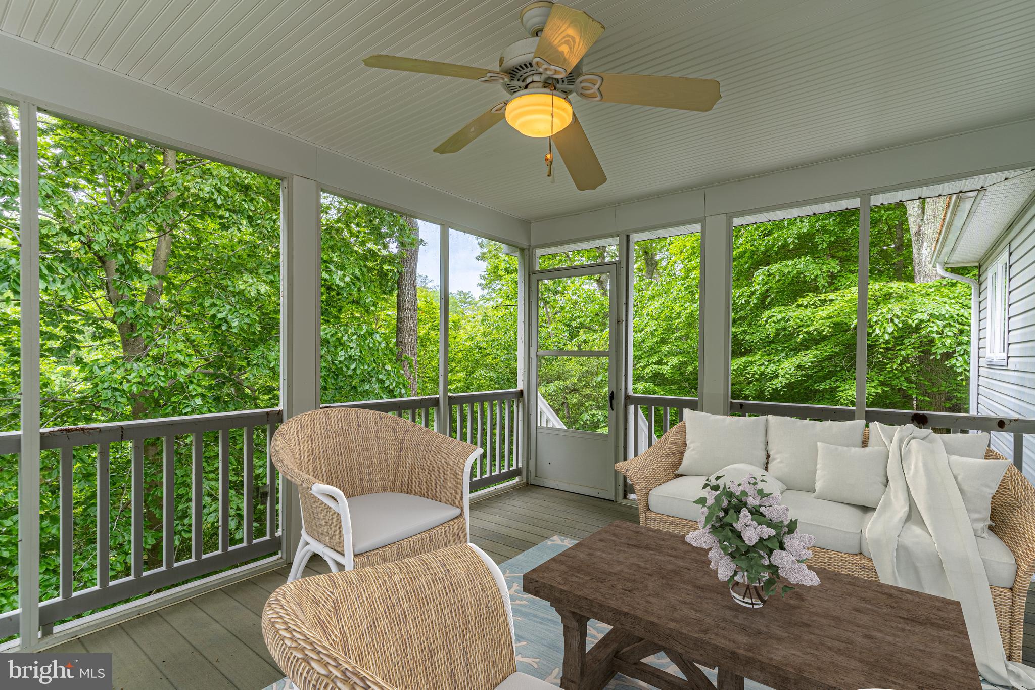 609 Running Fox Road Lusby, MD 20657 - Photo 8 of 17 Screened Porch Off of Primary Bedroom