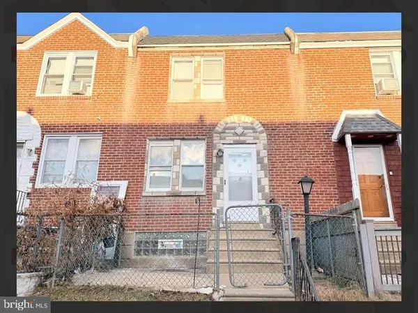 front view of a house with a large window