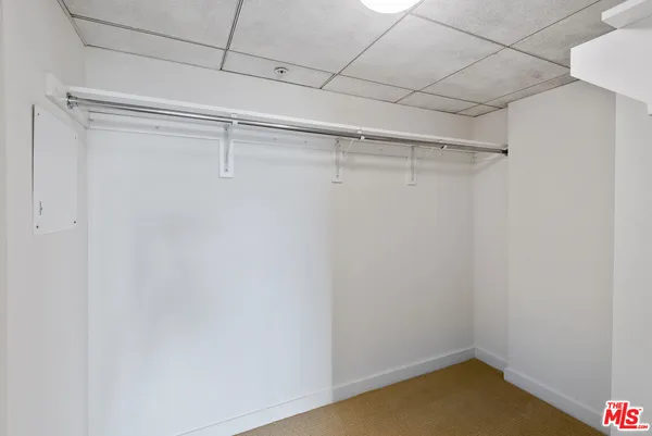 a view of a room with racks on the wall
