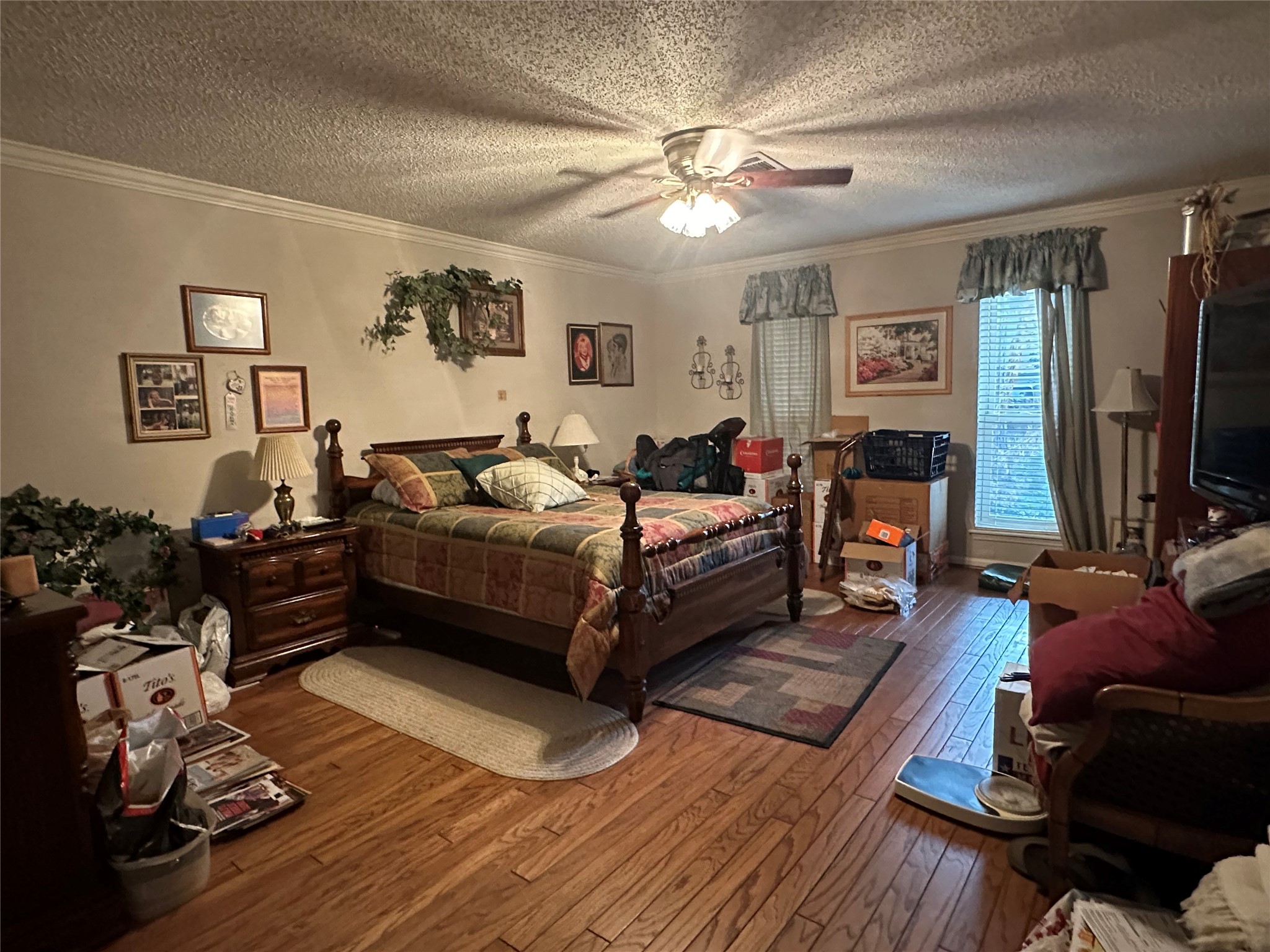 16114 Hexham Drive Spring, TX 77379 - Photo 12 of 18 View of the spacious primary bedroom with wood floors.