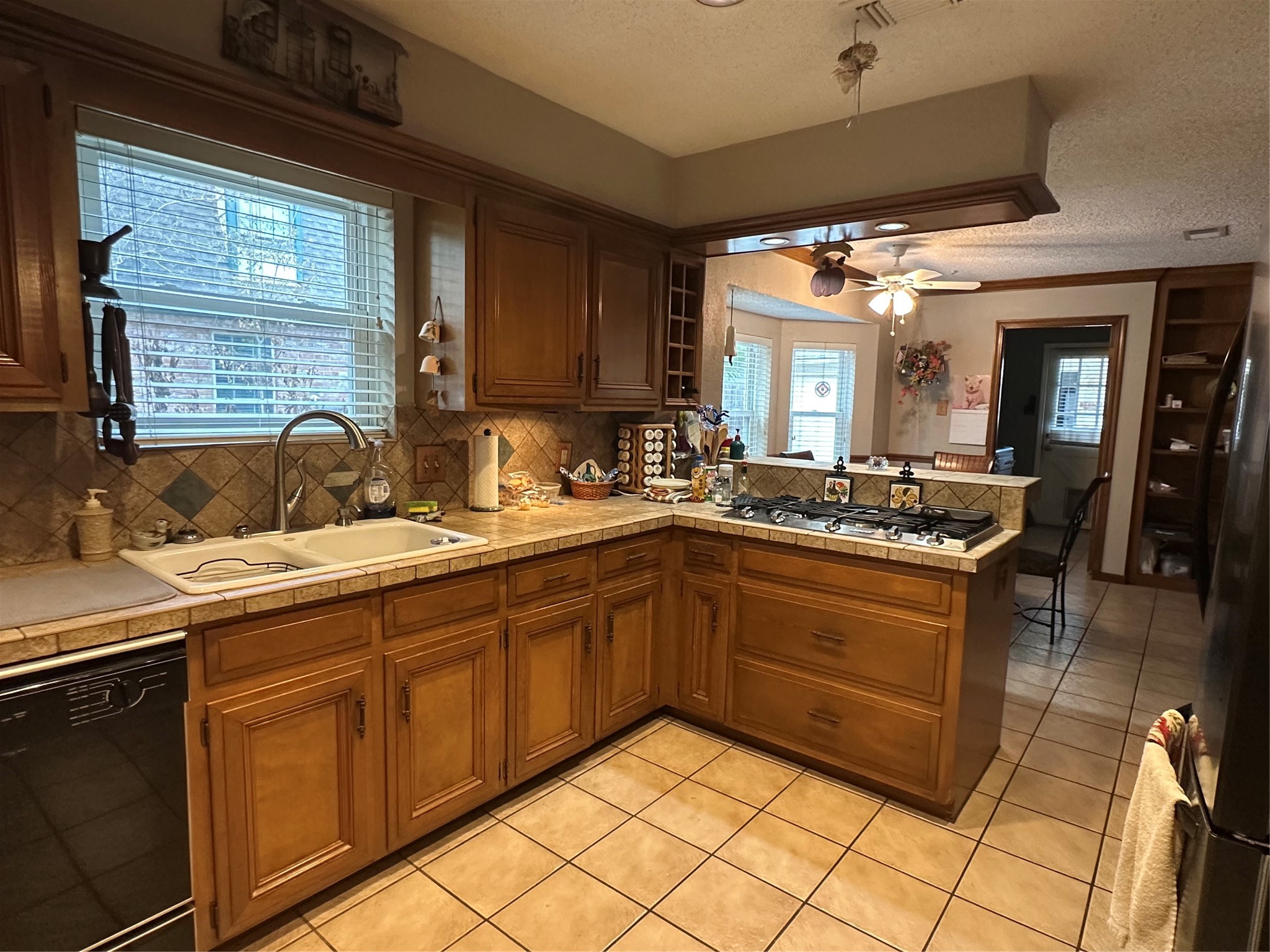 16114 Hexham Drive Spring, TX 77379 - Photo 8 of 18 View of the kitchen, breakfast room and utility room.