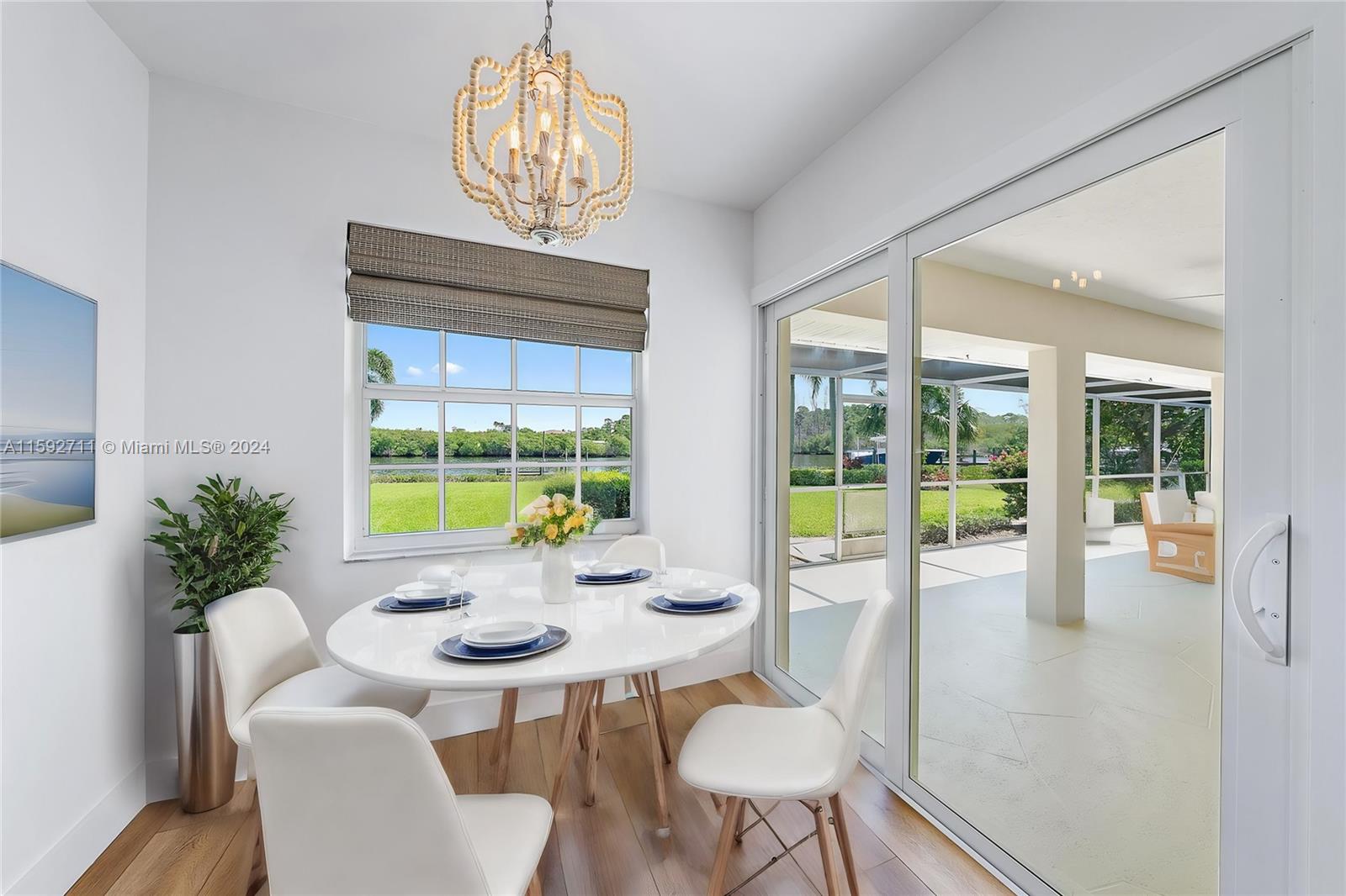 8547 Southeast Merritt Way Jupiter, FL 33458 - Photo 6 of 27 a view of a dining room with furniture window and outside view