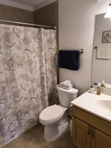 a bathroom with a toilet and a sink