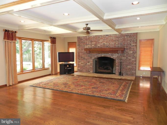 1625 Wyatts Ridge Road Crownsville, MD 21032 - Photo 8 of 30 Basement w/ brick gas fireplace & coffered ceiling