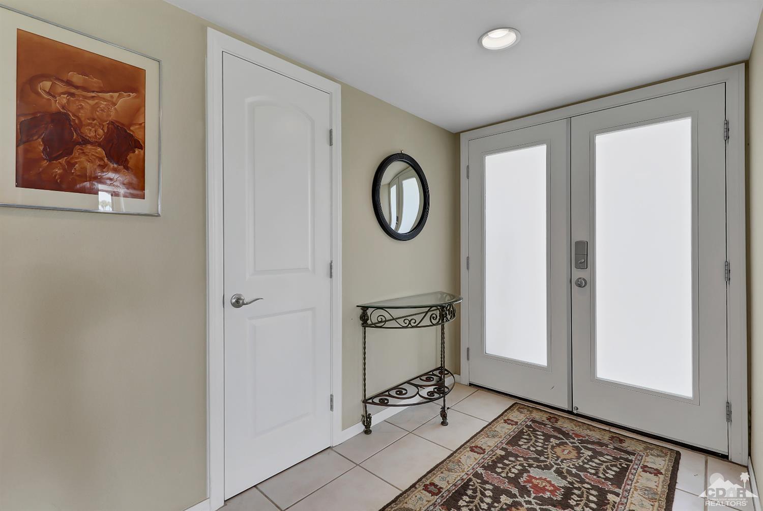 71 Calle Encinitas Rancho Mirage, CA 92270 - Photo 2 of 24 a view of a hallway with a workspace