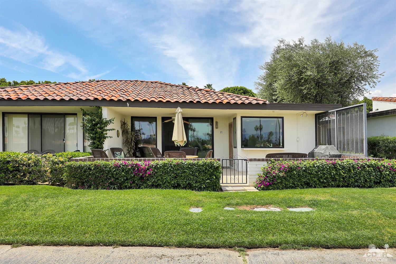 71 Calle Encinitas Rancho Mirage, CA 92270 - Photo 14 of 24 a front view of house with a garden