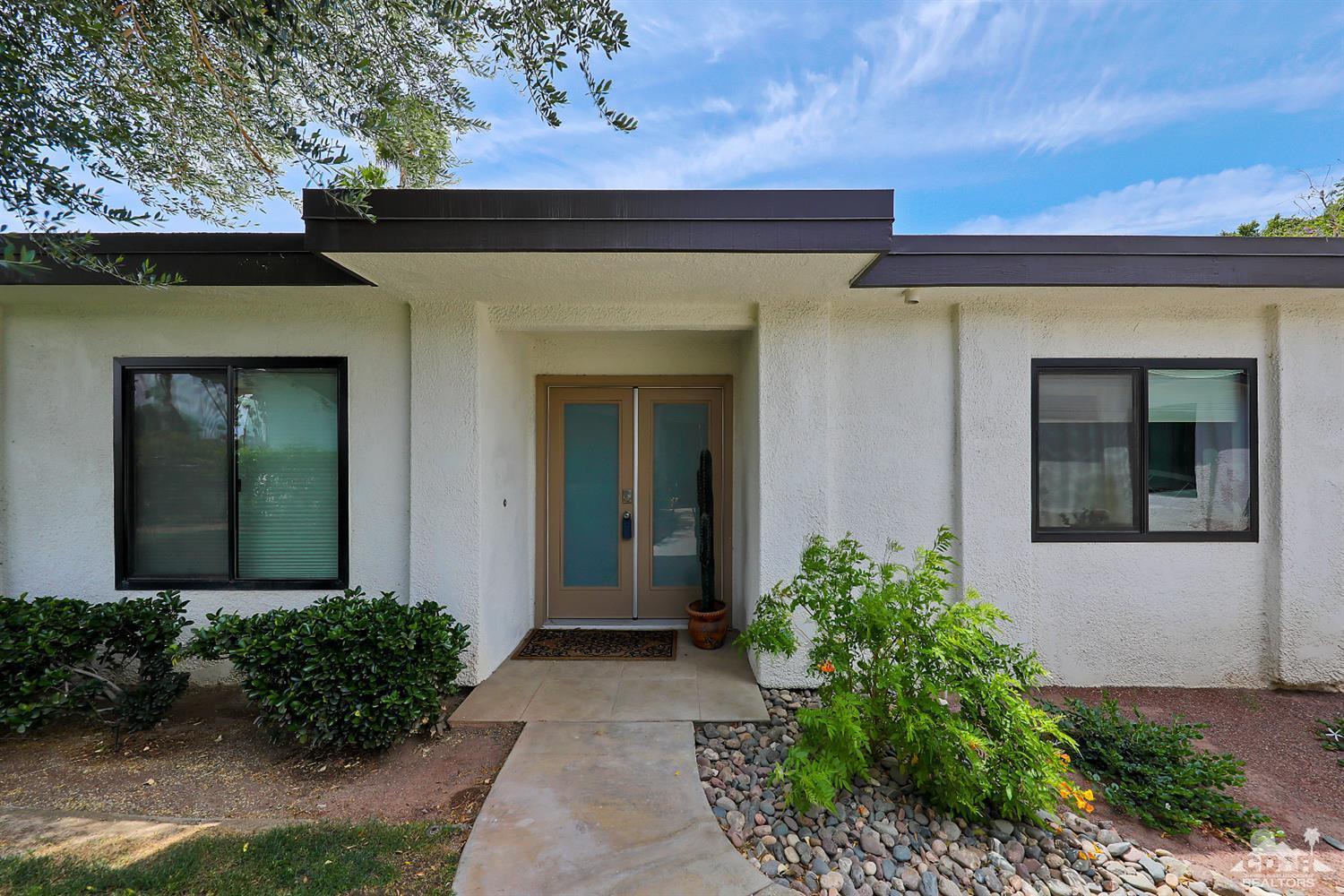 71 Calle Encinitas Rancho Mirage, CA 92270 - Photo 17 of 24 front view of a house with a yard