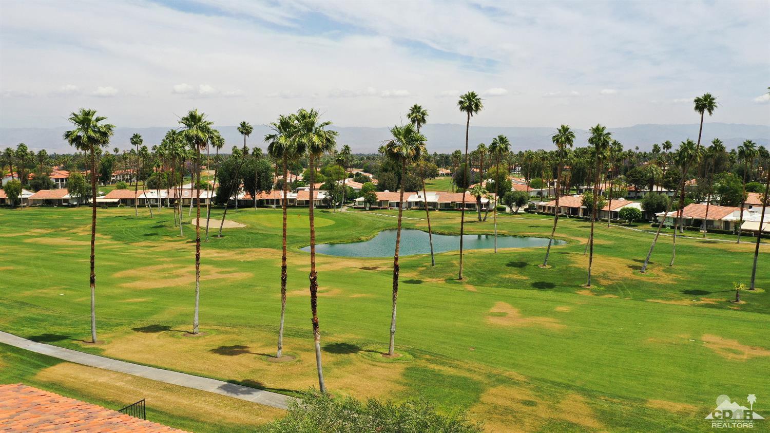 71 Calle Encinitas Rancho Mirage, CA 92270 - Photo 23 of 24 a view of a golf course with a lake
