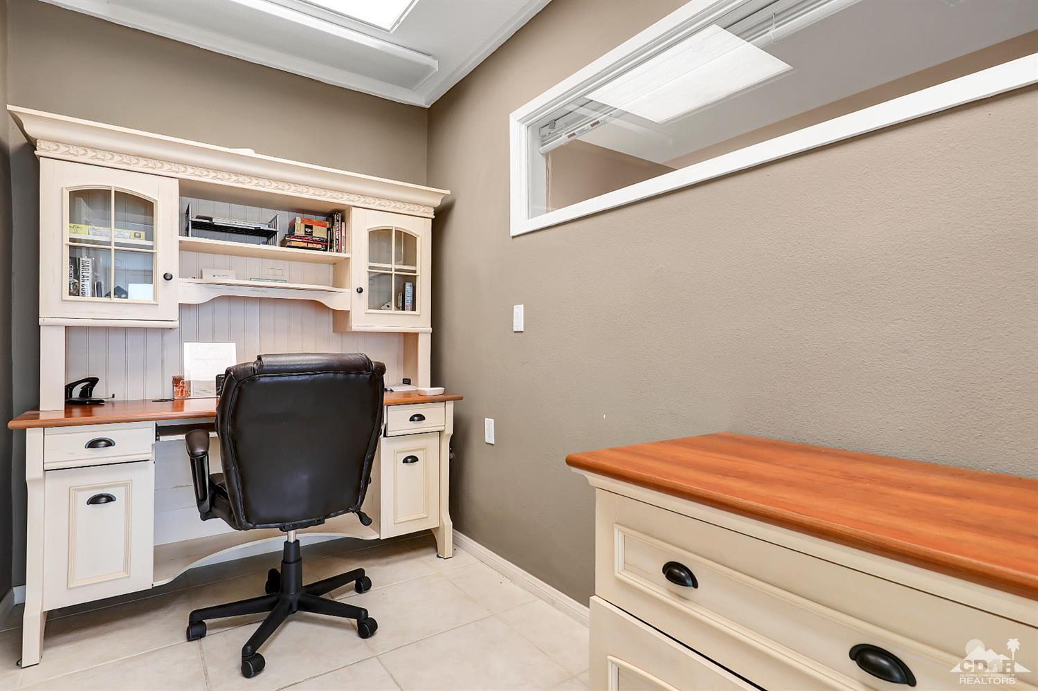 71 Calle Encinitas Rancho Mirage, CA 92270 - Photo 7 of 24 a room with a workspace