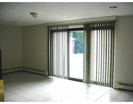 19 Edith Road Framingham, MA 01701 - Photo 8 of 10 a view of a room with a large windows