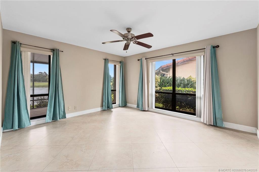 3281 Southwest Bobalink Way Palm City, FL 34990 - Photo 14 of 45 Primary bedroom.