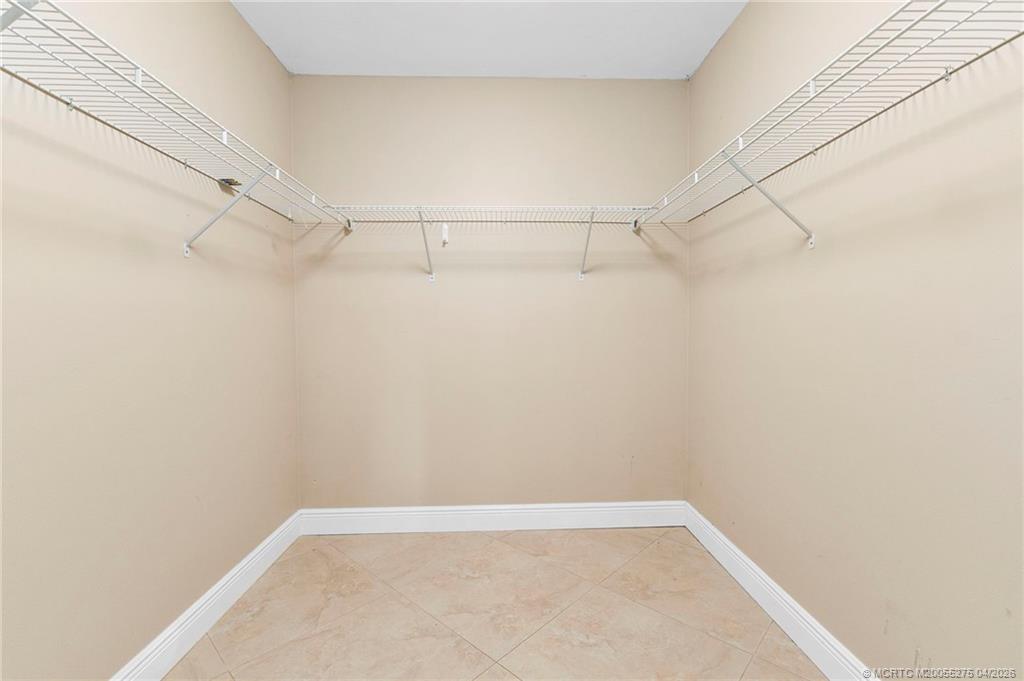 3281 Southwest Bobalink Way Palm City, FL 34990 - Photo 19 of 45 Walk in closet.
