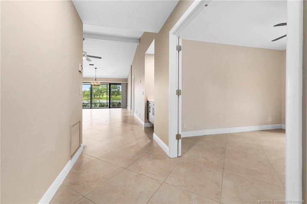 3281 Southwest Bobalink Way Palm City, FL 34990 - Photo 23 of 45 3rd bedroom with double french door entry.