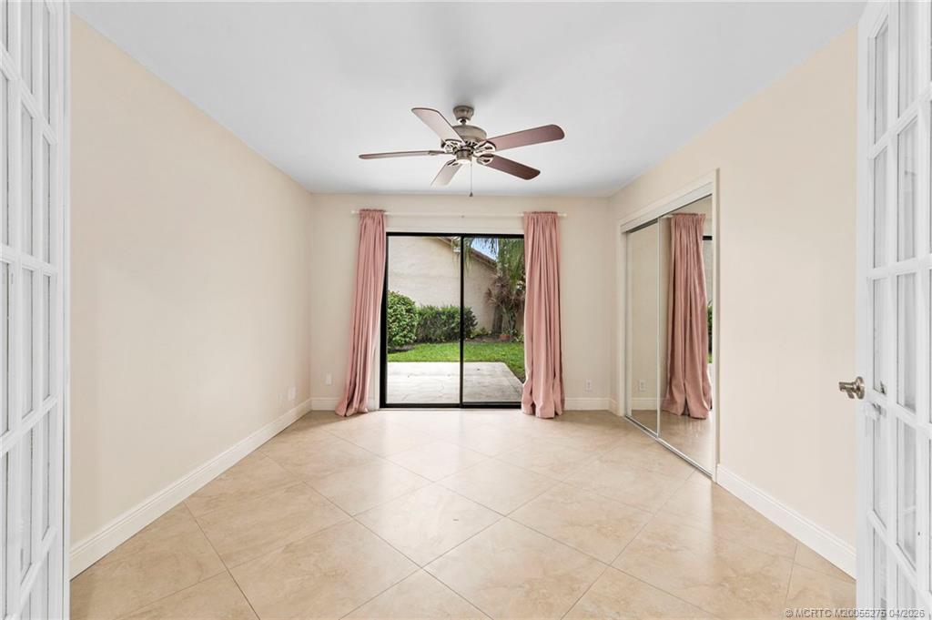 3281 Southwest Bobalink Way Palm City, FL 34990 - Photo 24 of 45 3rd bedroom can be used as den/office/playroom.