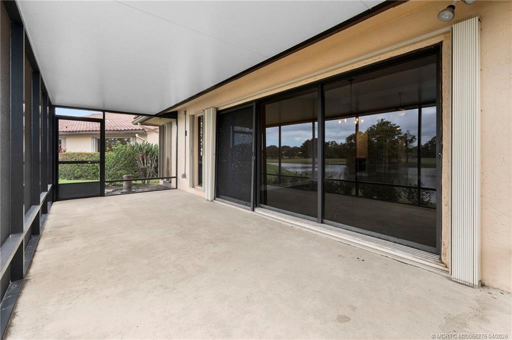 3281 Southwest Bobalink Way Palm City, FL 34990 - Photo 30 of 45 Oversized screened patio.