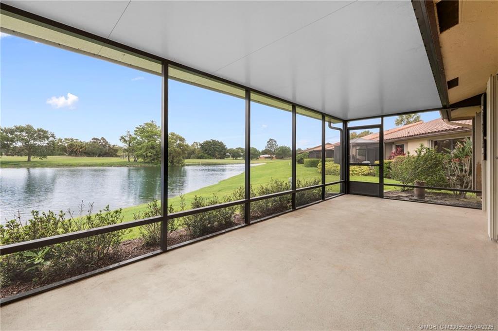 3281 Southwest Bobalink Way Palm City, FL 34990 - Photo 31 of 45 Lake view from screened patio.