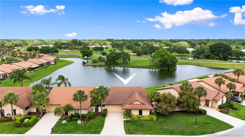 3281 Southwest Bobalink Way Palm City, FL 34990 - Photo 4 of 45 Long Lake views from screened patio and back yard.