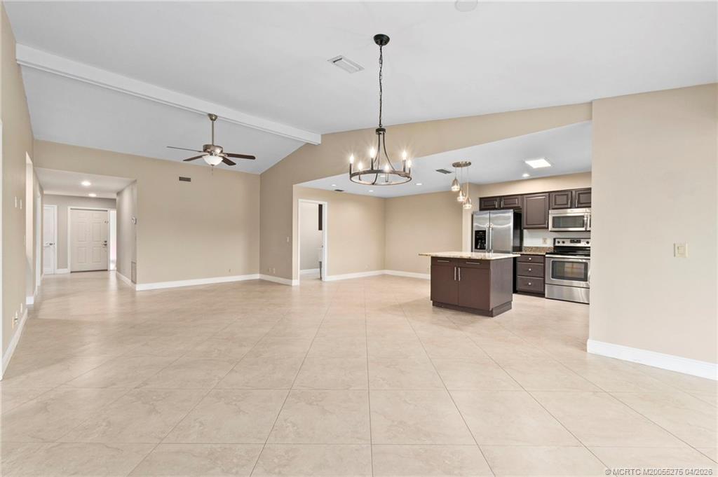 3281 Southwest Bobalink Way Palm City, FL 34990 - Photo 7 of 45 Open concept Kitchen, living and dining.