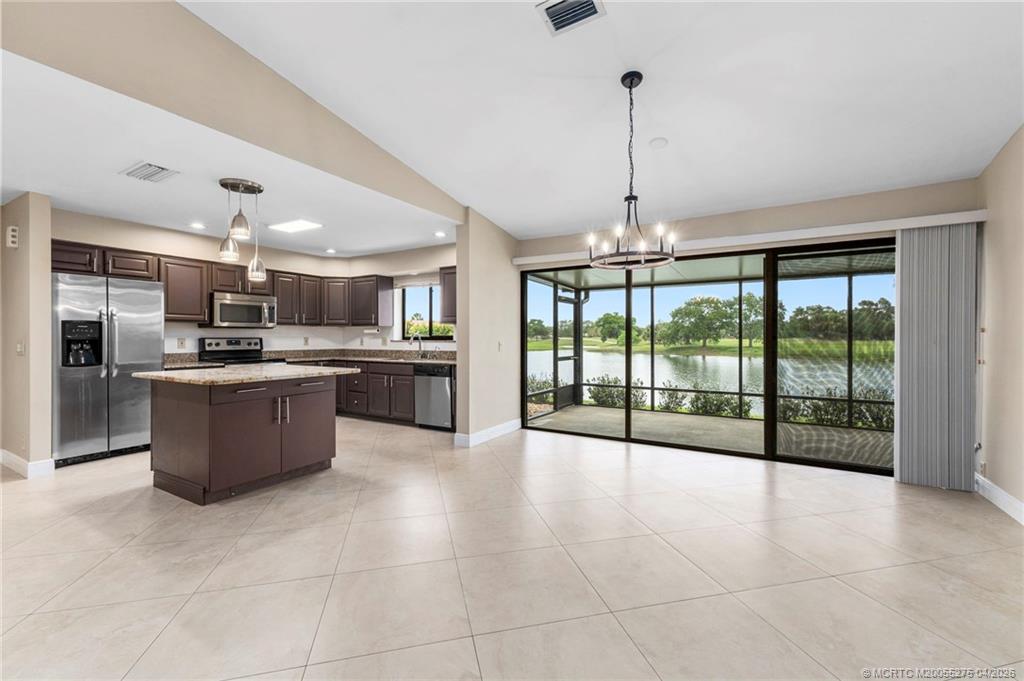 3281 Southwest Bobalink Way Palm City, FL 34990 - Photo 8 of 45 Triple slider to porch.