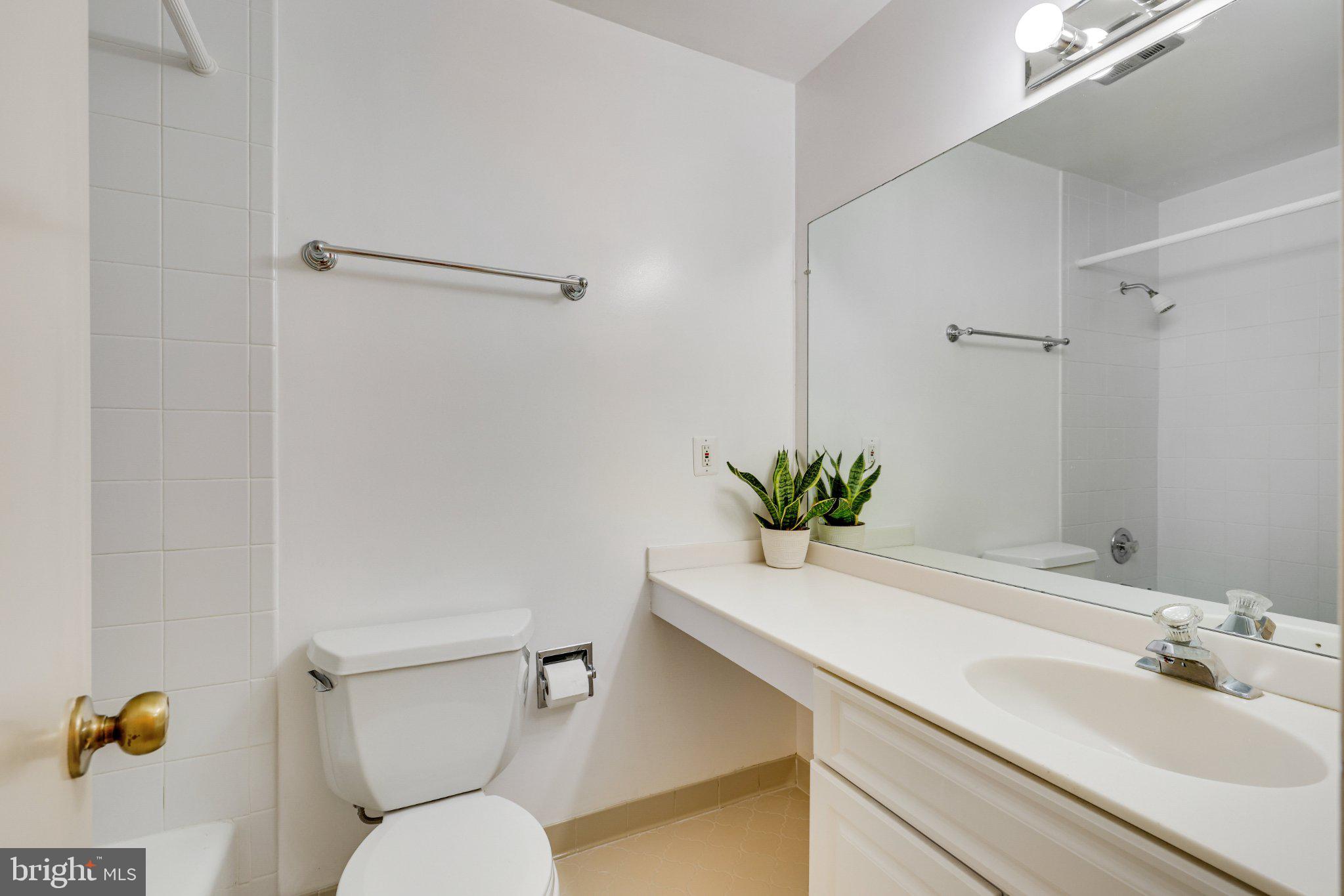 1427 Laurel Hill Road Vienna, VA 22182 - Photo 38 of 57 Modern bathroom with sleek design.