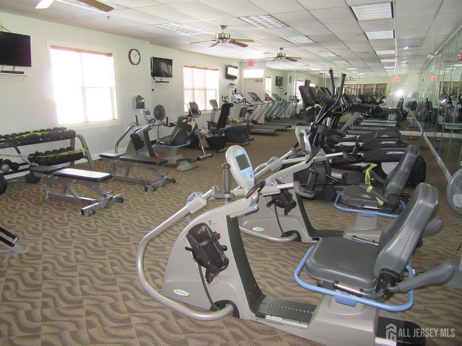 114 Orleans Road Monroe Township, NJ 08831 - Photo 17 of 22 a room with gym equipment
