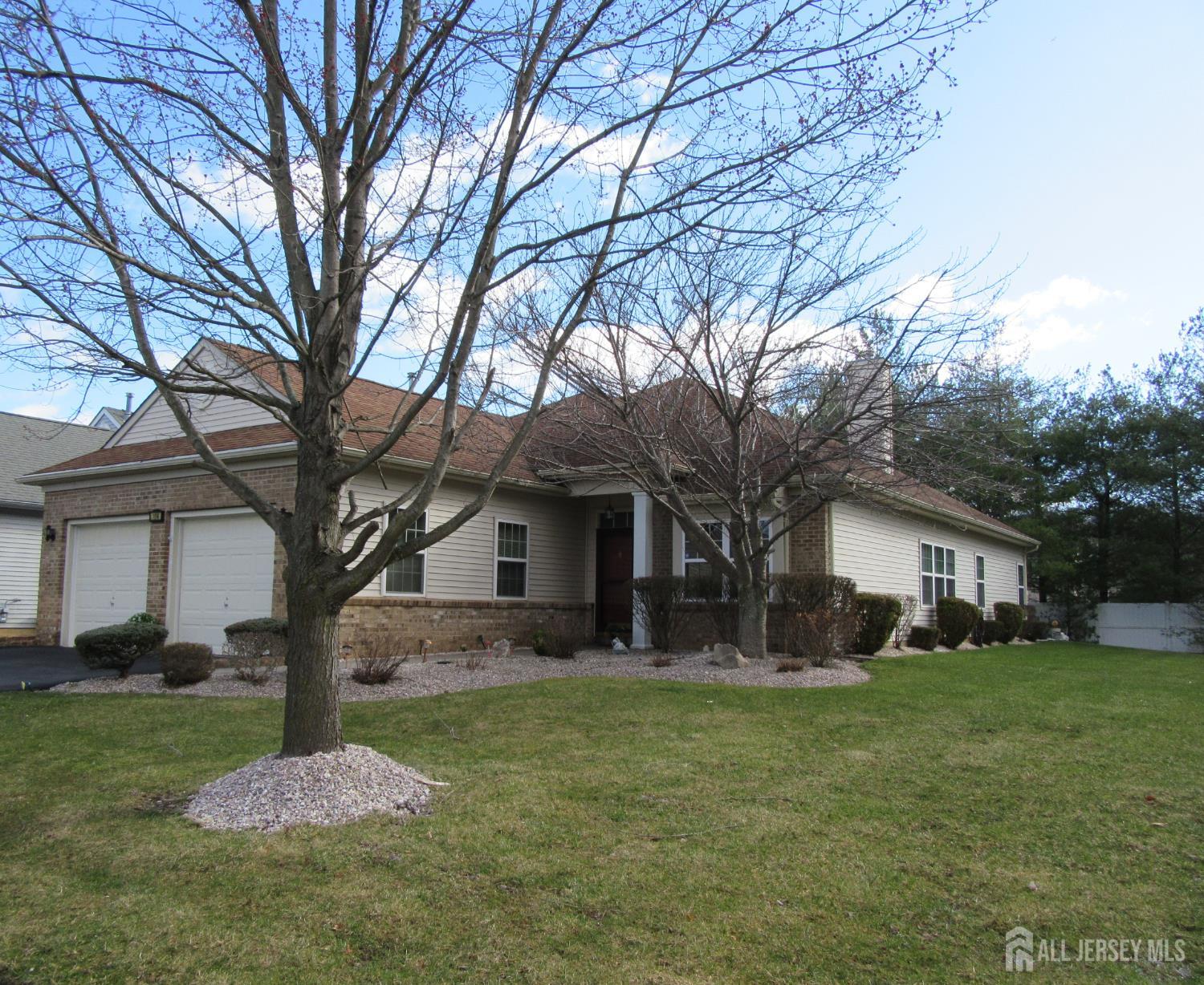 114 Orleans Road Monroe Township, NJ 08831 - Photo 2 of 22 a front view of house with yard