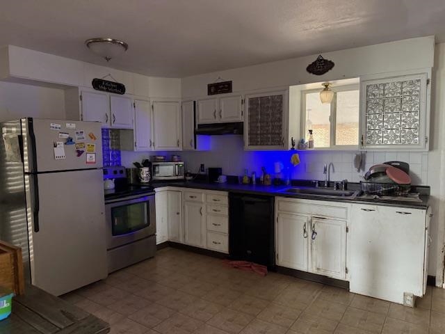 851 21 Road Fruita, CO 81521 - Photo 14 of 17 a kitchen with granite countertop a sink stainless steel appliances and window