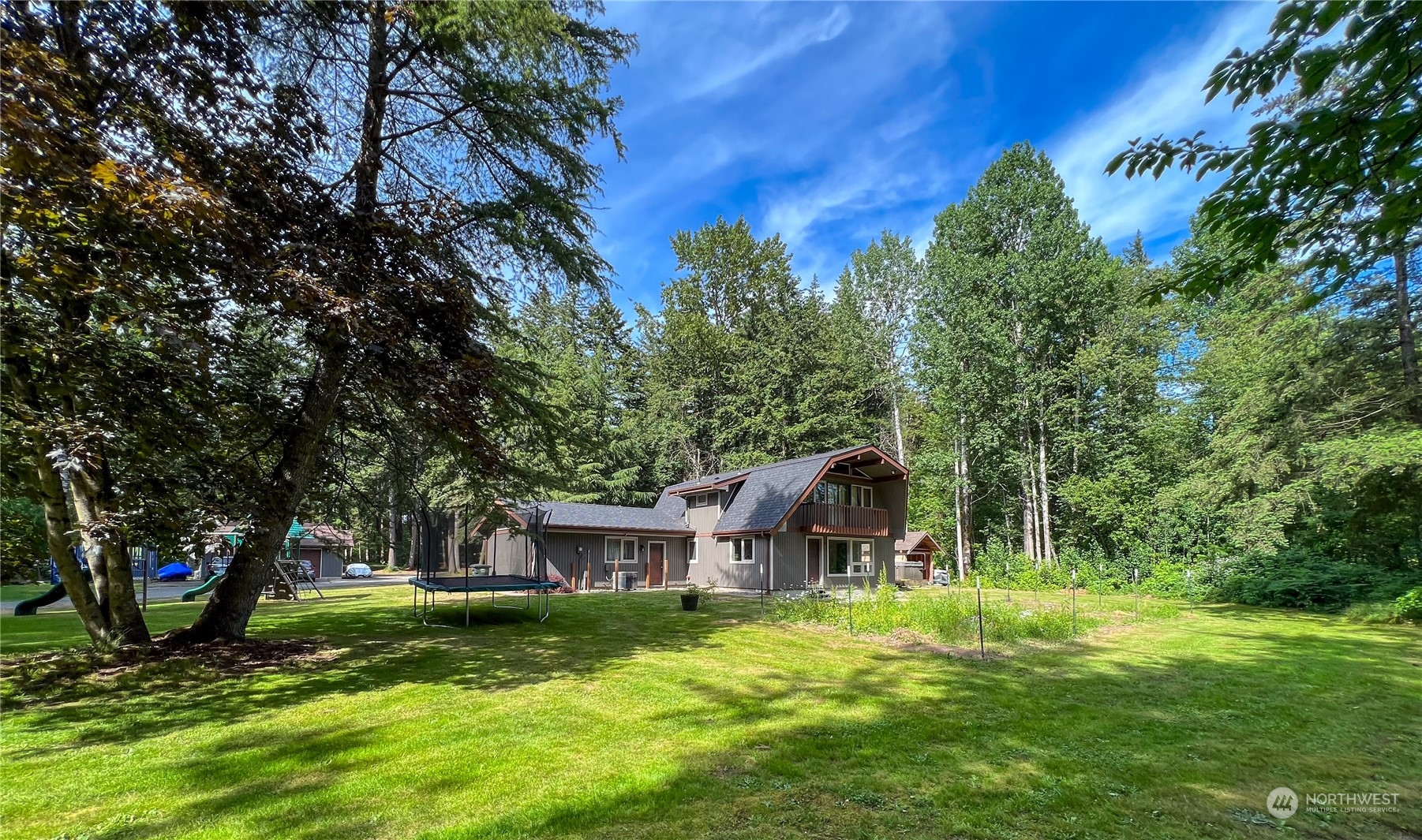 1958 Zell Road Ferndale, WA 98248 - Photo 1 of 28 a view of a house with a backyard