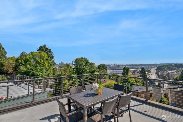 a view of a chairs and table on the terrace