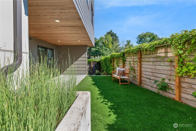 a view of a back yard of the house