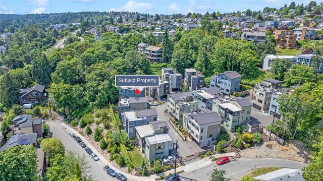 an aerial view of a city with lots of residential buildings